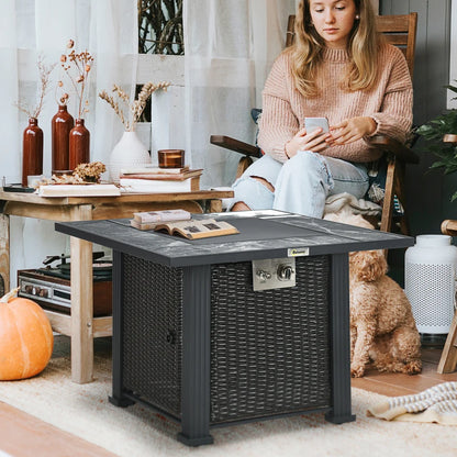 50,000 BTU - Rattan Style Fire Pit Table with Black Marble Tabletop Style Surround and Glass Windscreen