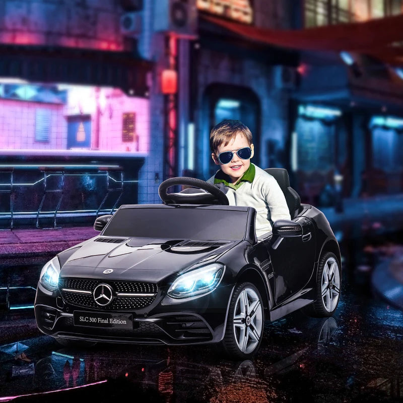 12V Kids Electric Ride On Car with Parental Remote, Two Motors, Music, Lights and Suspension - Black