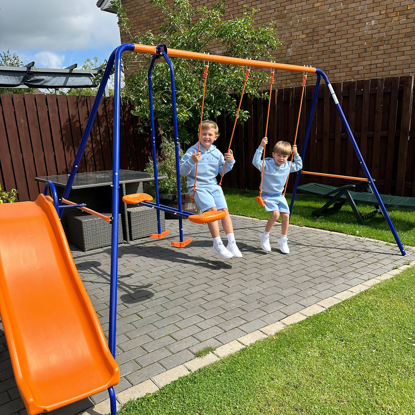 Four-In-One Metal Garden Swing Set, with Double Swings, Glider, Slider, Ladder - Orange and Blue